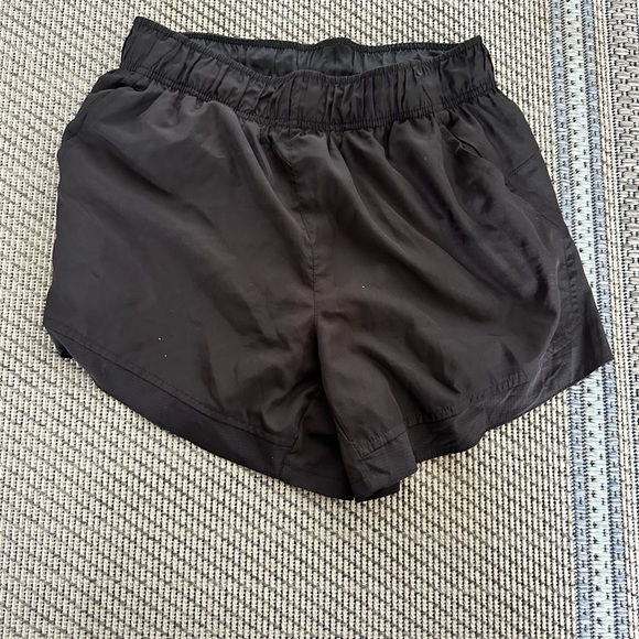 two pocket running shorts with build in underwear - Picture 3 of 5